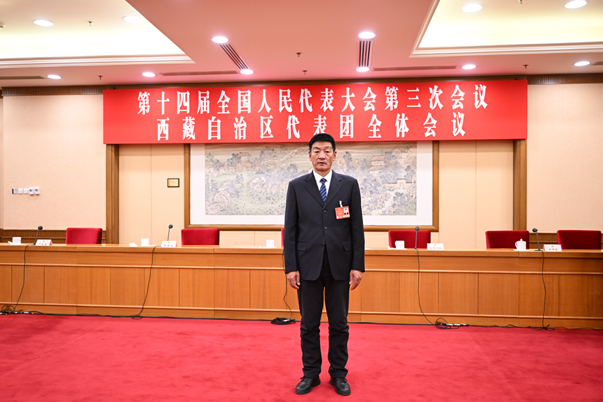 全國人大代表、國網(wǎng)拉薩供電公司城區(qū)供電服務中心帶電作業(yè)保電班副班長扎西尼瑪。次吉美朵攝